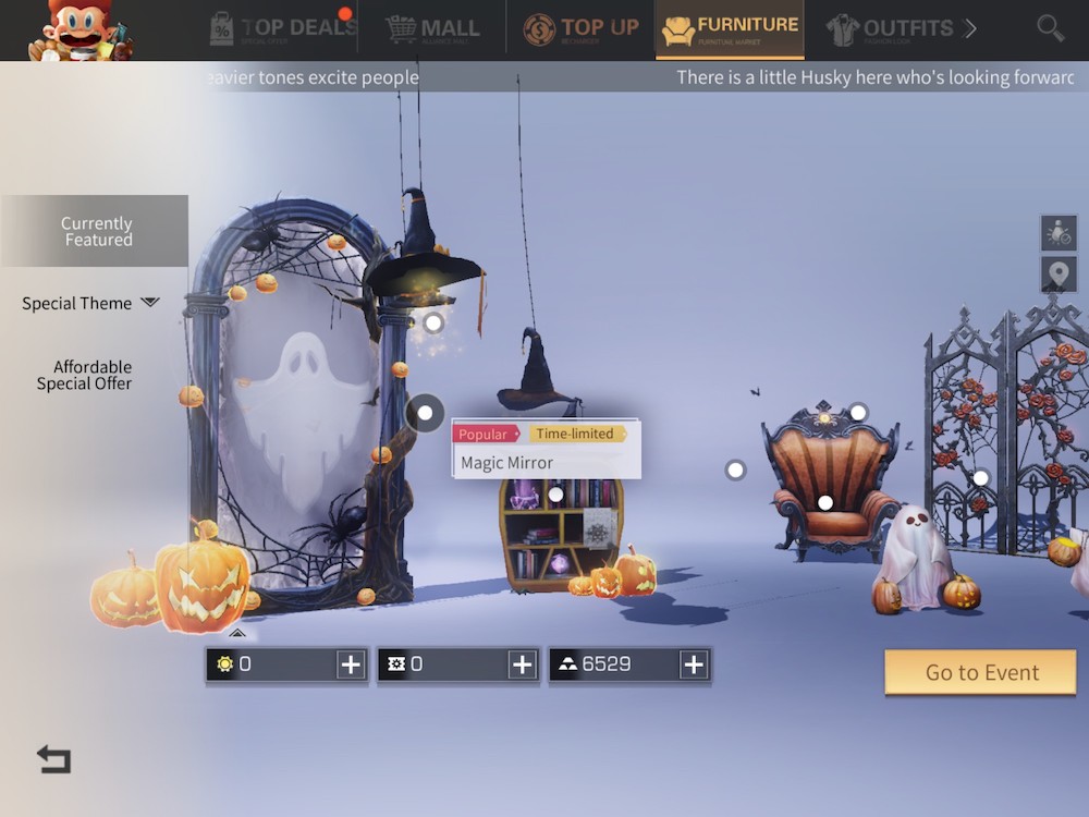 Halloween-themed event with decorative buildings 