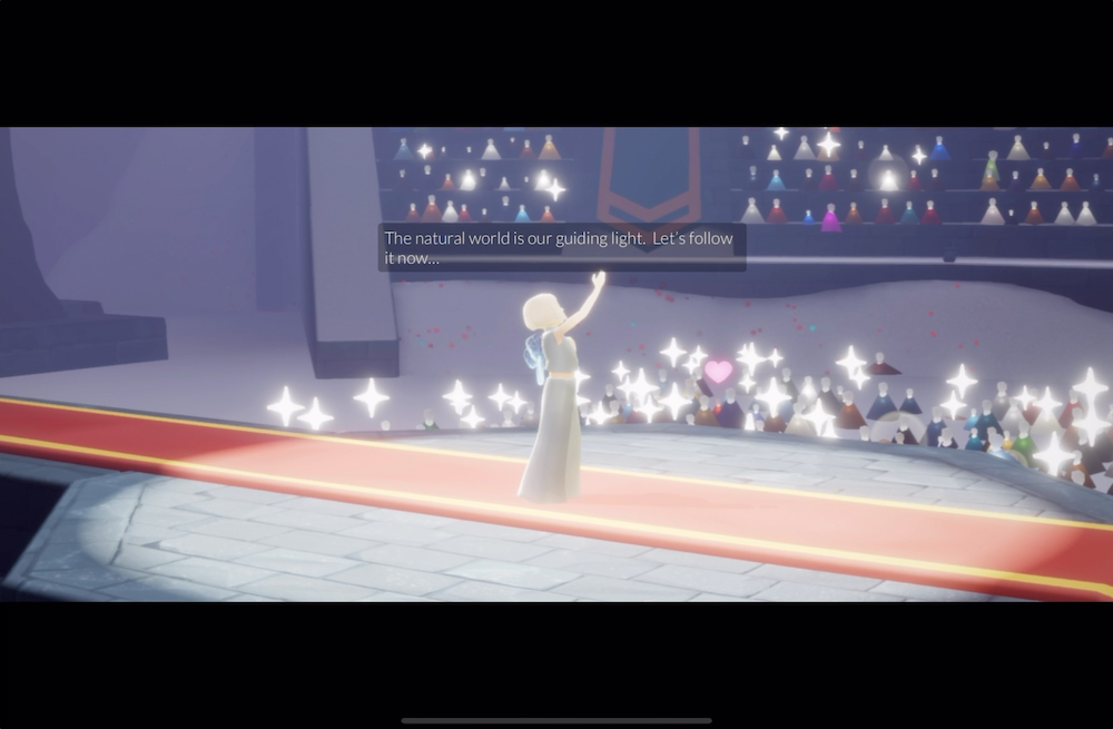 AURORA speaks directly to the audience during the concert in Sky: Children of the Light.